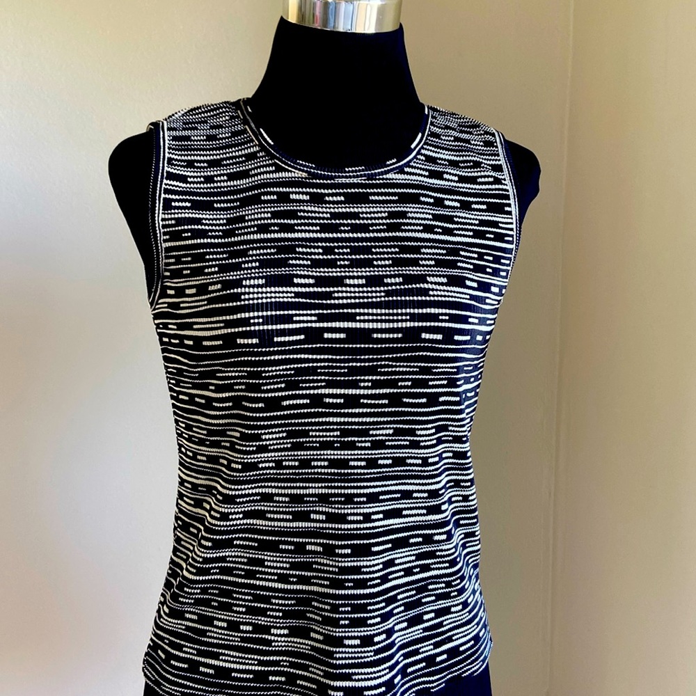 Sleeveless tank style, dressy or dress down